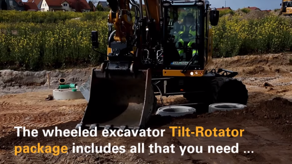 Cat's wheeled excavator tilt rotator in action Industrial Vehicle